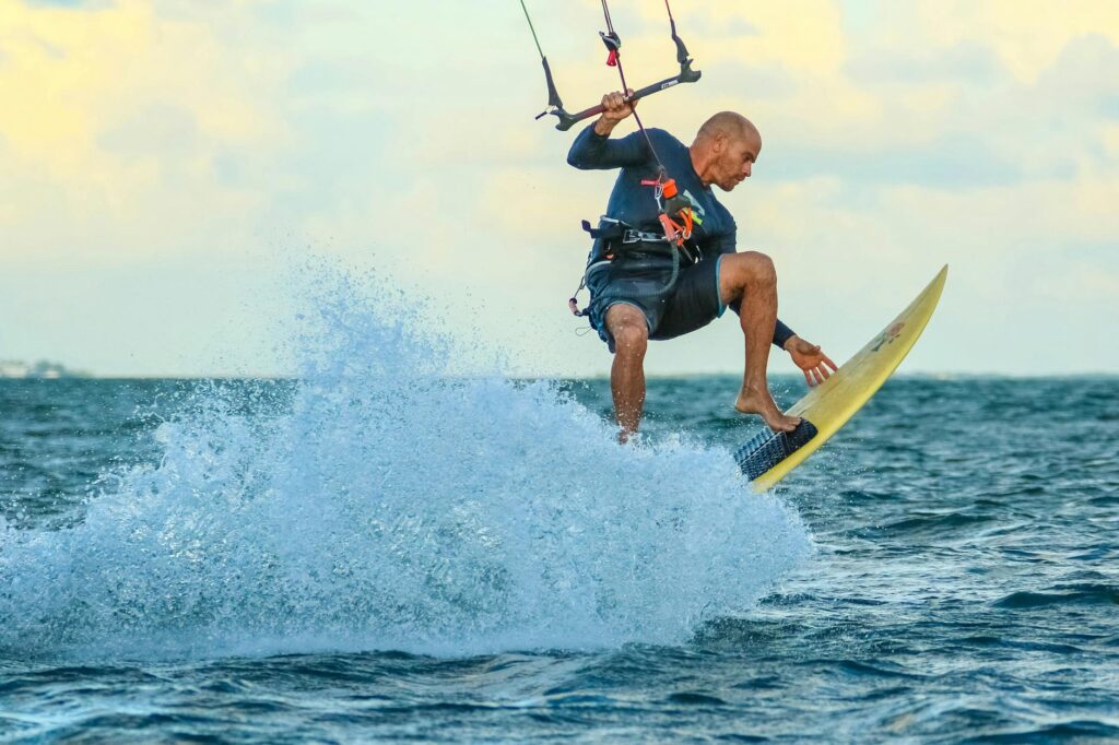 photo of man surfing